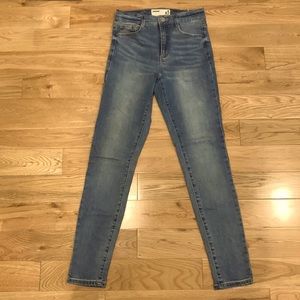 Garage Light-washed Skinny Jeans.